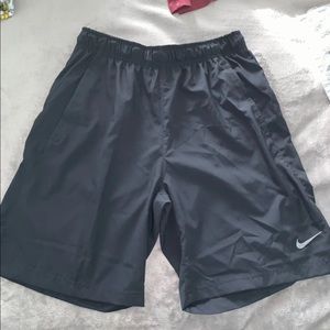 black windbreaker nike shorts
